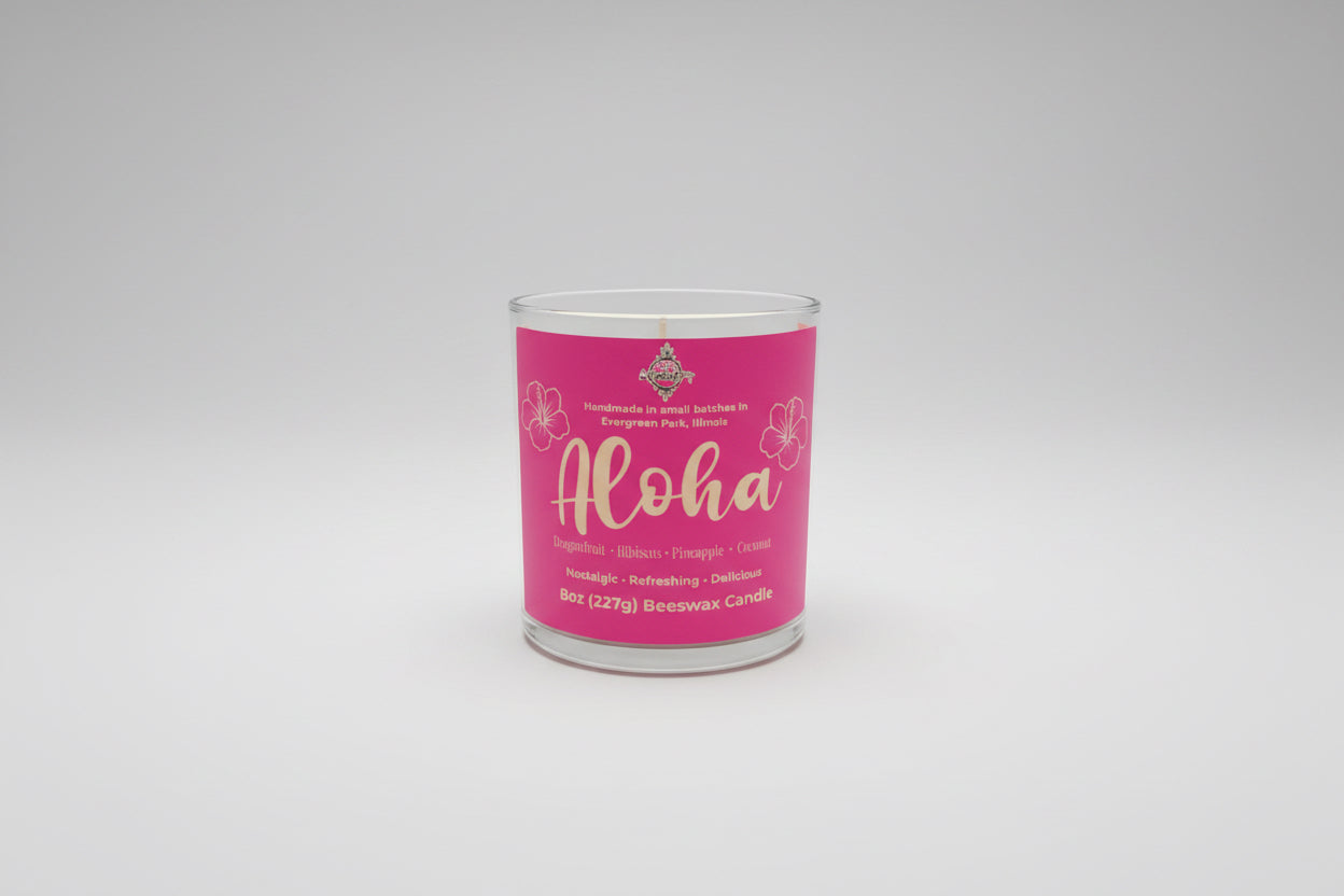 Candle with pink label on a whiteboard te background l.