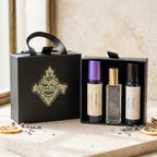Trio of rollers in a black gift box with black box next to it with the Blissfully Rooted logo on the front.  