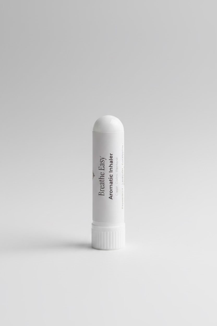 White 'Breathe Easy' aromatic inhaler on a neutral surface with a blurred background