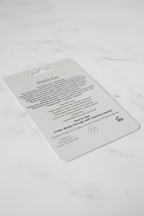 Product packaging with text on a white surface