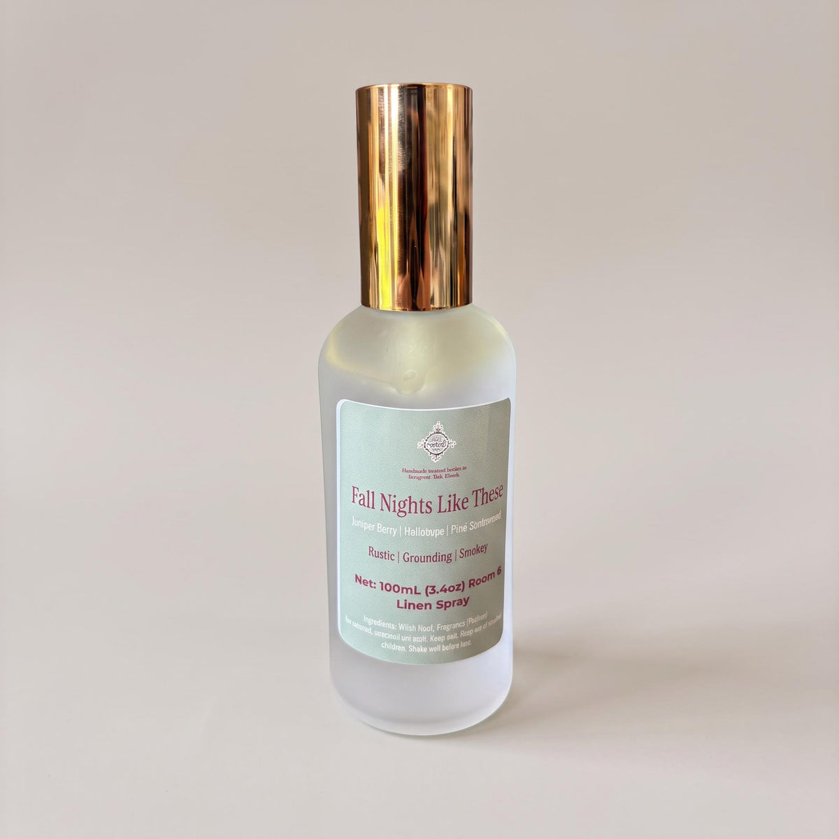 A 100mL bottle of Linden Spray by The Apothecary Co., featuring a frosted glass body, a light green label, and a metallic rose gold cap, set against a plain light beige background.