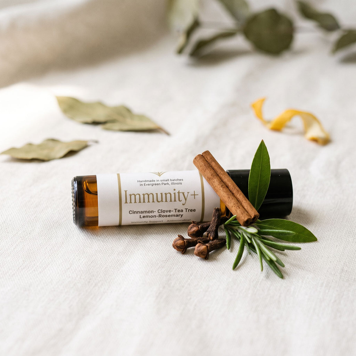 Immunity+ Roller with cinnamon, rosemary, and clove