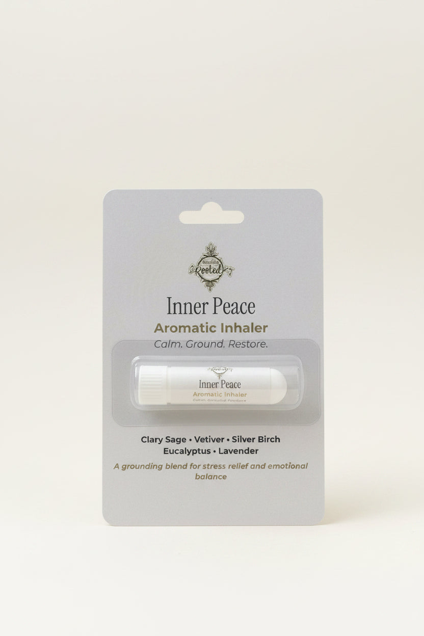 Aromatic inhaler on a card with 'Inner Peace' branding on a white surface.