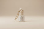 Candle labeled 'Last One Standing' with a decorative element on a neutral background