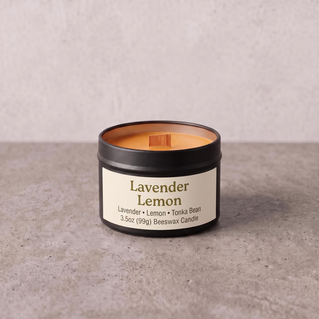 A 3.5 oz beeswax candle in a matte black tin with a cream label reading 'Lavender Lemon' and 'Lavender + Lemon + Tonka Bean'.