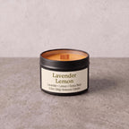 A 3.5 oz beeswax candle in a matte black tin with a cream label reading 'Lavender Lemon' and 'Lavender + Lemon + Tonka Bean'.