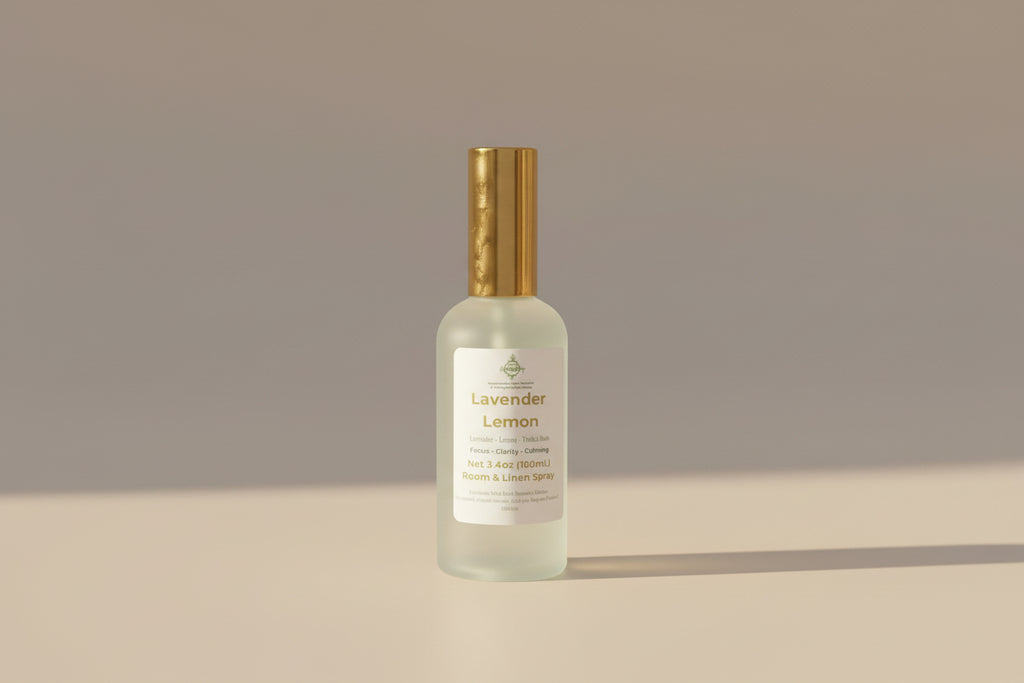 Bottle of Lavender Lemon essential oil on a neutral backgroun.g