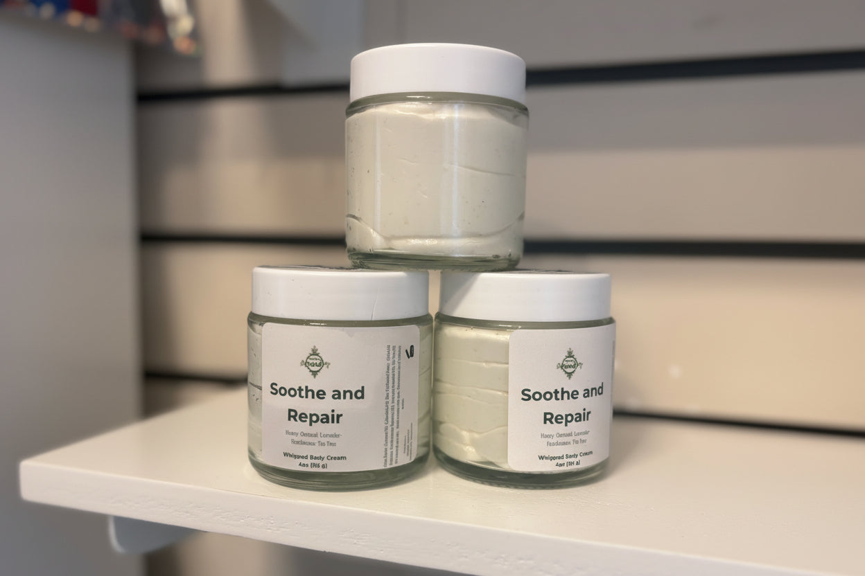 Three jars of 'Soothe and Repair' cream on a shelf.